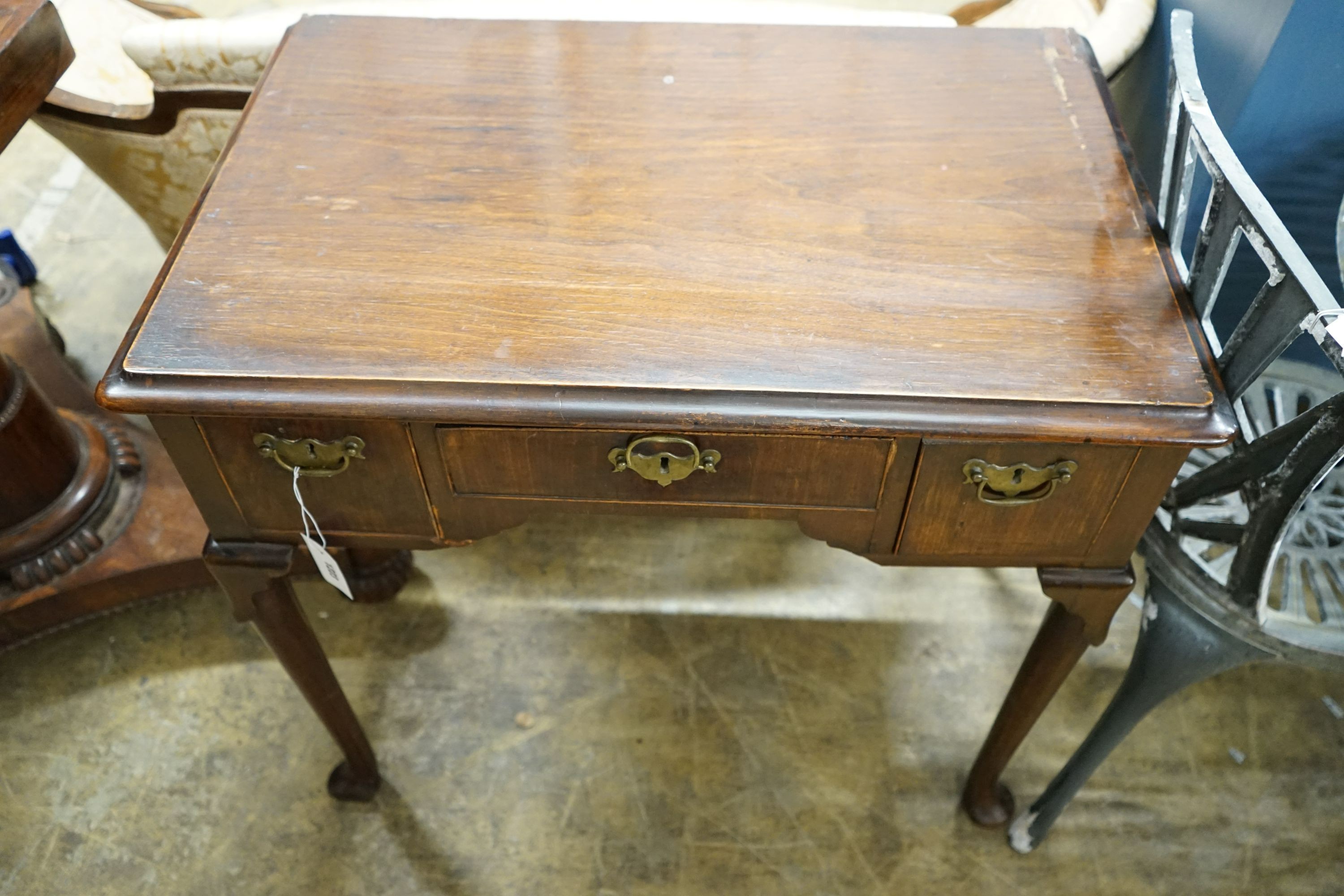 A George II and later walnut lowboy, width 79cm, depth 50cm, height 72cm